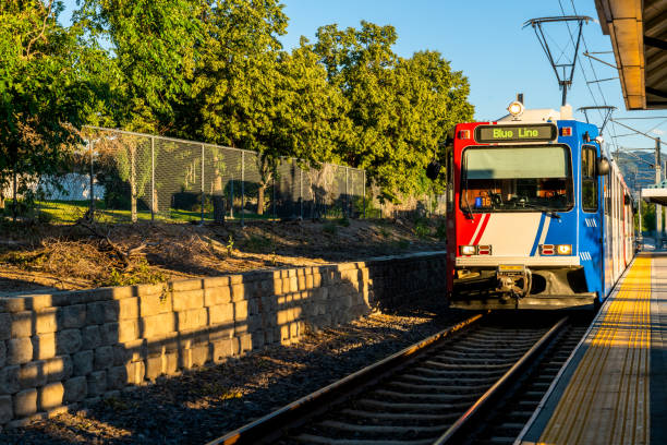 istock Idyllic train stop, warm breeze, breathtaking mountain vistas. 1559191174