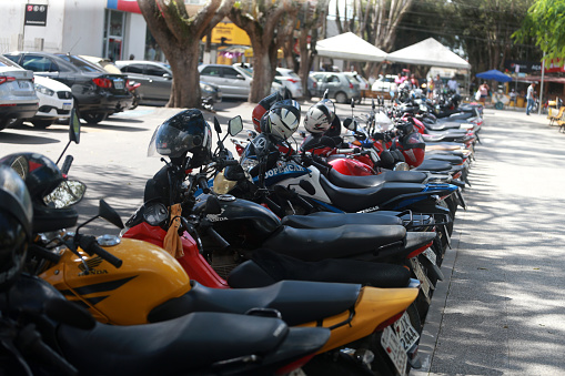 cruz das alma, bahia, brazil - july 17, 2023: Parking of motorcycles in a square in the city of Cruz das Almas.