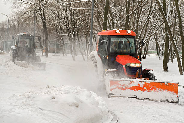 istock Two tractor snow removal in the park 155920679