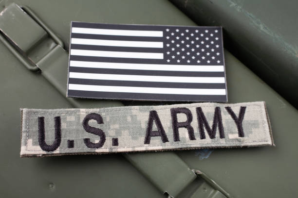 istock US ARMY Branch Tape with national US flag patch on green ammo can 1559319626