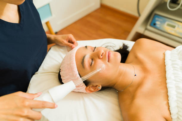 istock Beautiful woman getting a Hydradermabrasian treatment 1559330584