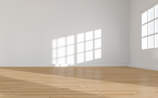 Empty living room with big window, wood floor, stair at the daylight