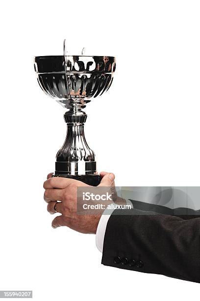 Geschäftsmann Holding Trophy Stockfoto und mehr Bilder von Geschäftsmann - Geschäftsmann, Halten, Anreiz