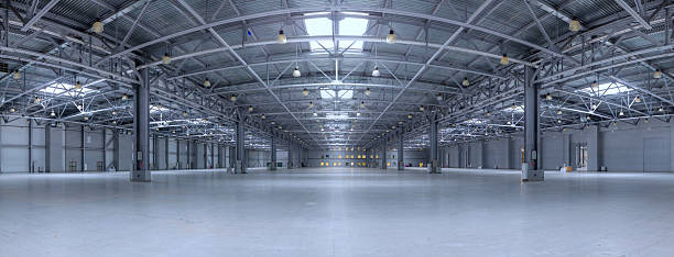 Modern storehouse Large modern empty storehouse. Very big resolution panorama. airplane hangar photos stock pictures, royalty-free photos & images