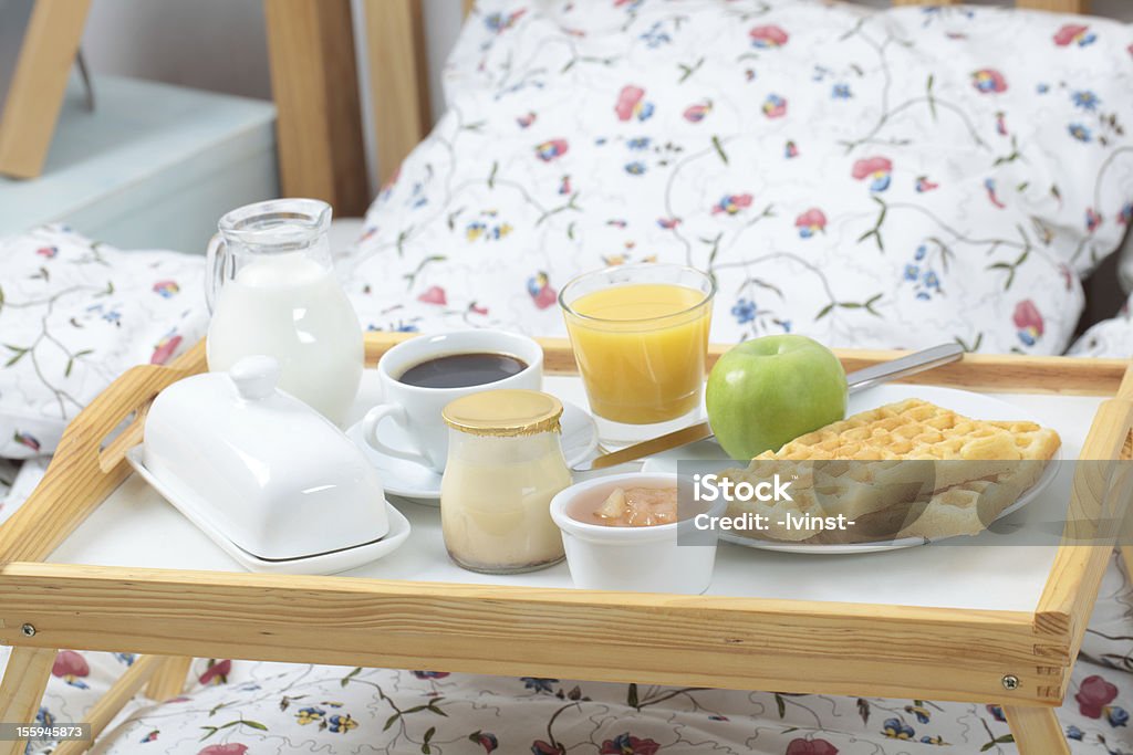 Breakfast on a bed Tray with breakfast on a bed Apple - Fruit Stock Photo