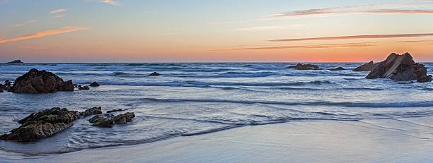 istock Beach: sunset and blue sea, seascape panoramic - Cornwall. 155949272