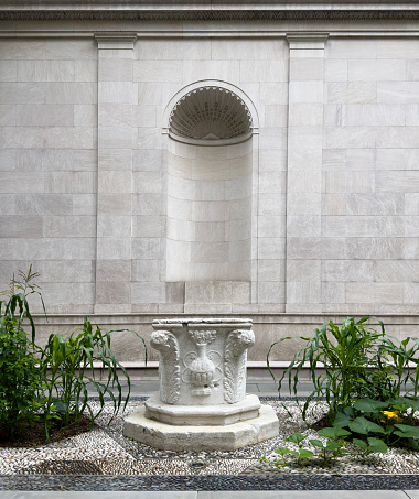 Ornamental garden with marble wall