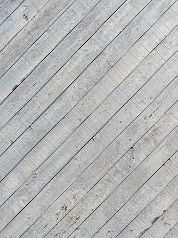 Full frame white hardwood floor with diagonal lines