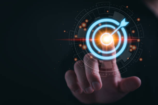 istock Businessman hand touching to target dart board for setup and achievement objectives target for business investment concept. 1559518431