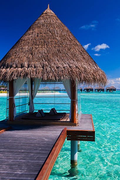 istock Overwater spa in lagoon around tropical island 155951961