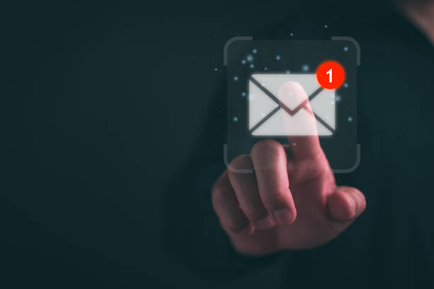 istock New email notification concept for business e-mail communication and digital marketing. Inbox receiving electronic message alert. business people touch on email in virtual screen. Internet technology. 1559522497