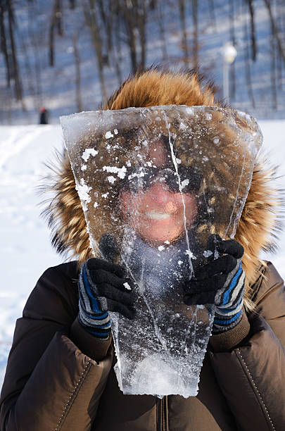 istock Woman with piece of ice. 155956907