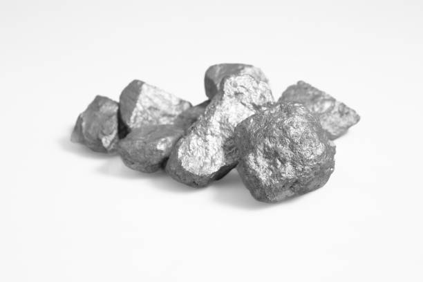 istock Pure platinum or silver or rare mineral from the mine on white background 1559613826