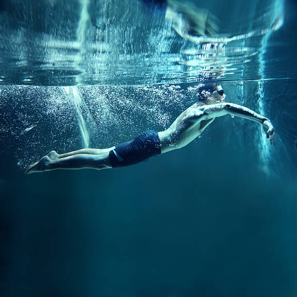 istock professional swimmer underwater swimming Butterfly 155963618