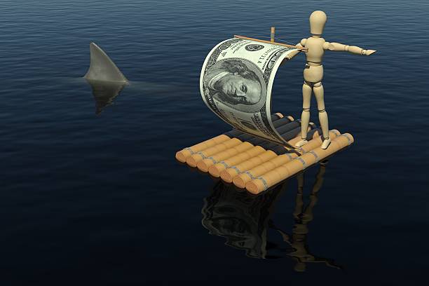 istock Wooden man on the raft with sail from dollar bill 155964953
