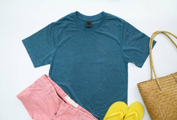 istock Blank blue womens cotton Tshirt mockup with jeans summer collection isolated on white background. Design t shirt template, print presentation mockup. Top view flat lay. 1559697863