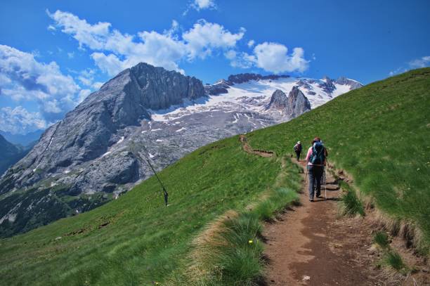 istock Hiking in Dolomite mountains in Italy 1559700413