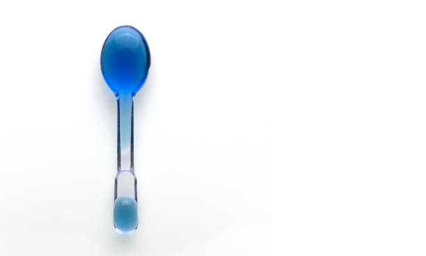 istock Miniature plastic spoons used for children candy snacks 1559702028