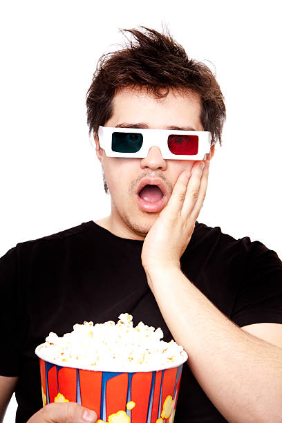 istock Funny men in stereo glasses with popcorn. 155971543