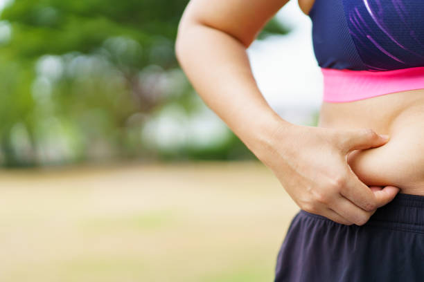 istock Woman exercising at the park. 1559722278