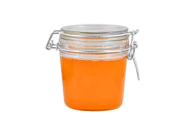 istock Glass jar with honey 155974484