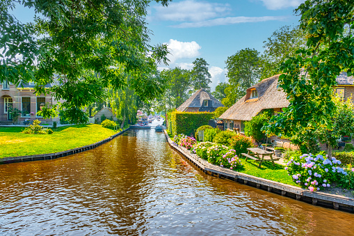 Giethoorn is a mostly car-free touristic village in the northeastern Dutch province of Overijssel. It’s known for its waterways.