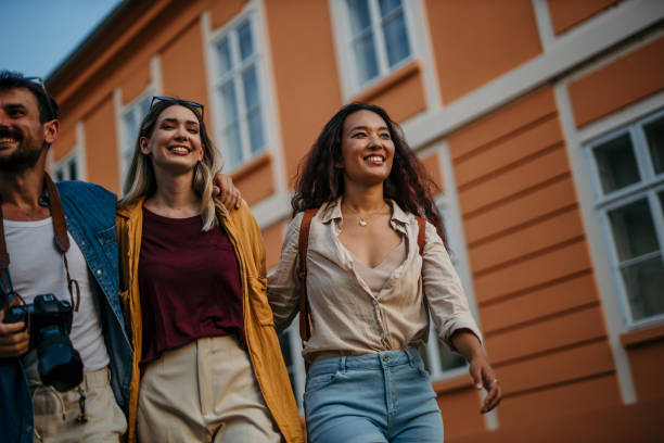 istock Tourists explore the city. 1559813741