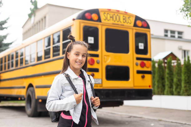 istock nine years old girl student at school. 1559817347