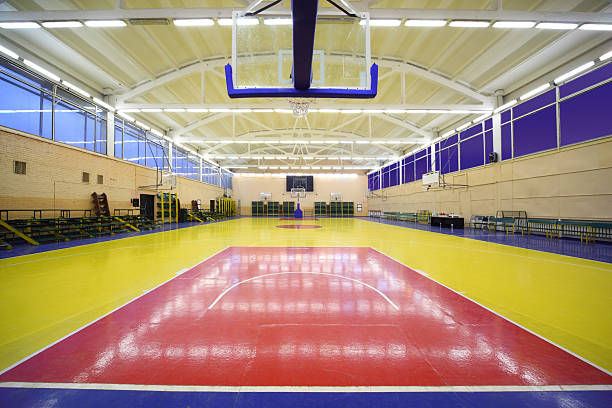 istock lighted school gym hall with basket 155983391