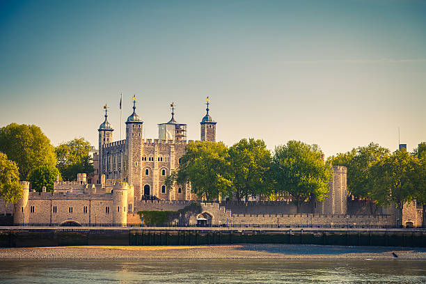 Tower of London along the north shore of the River Thames stock photo