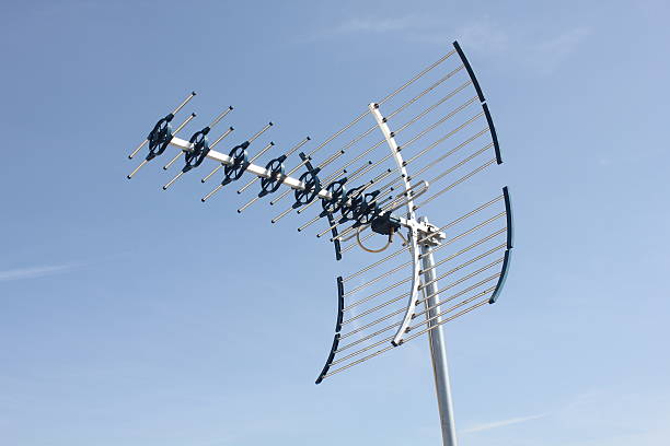 UHF Antenna UHF Antenna with blue background. animal antenna stock pictures, royalty-free photos & images