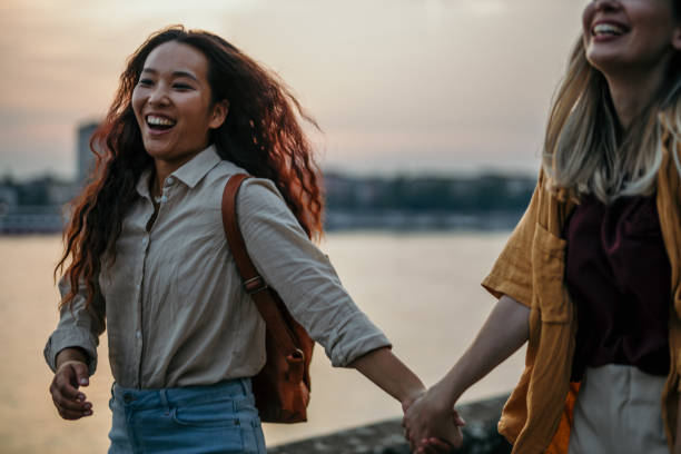 istock Girls sunset fun 1559854769