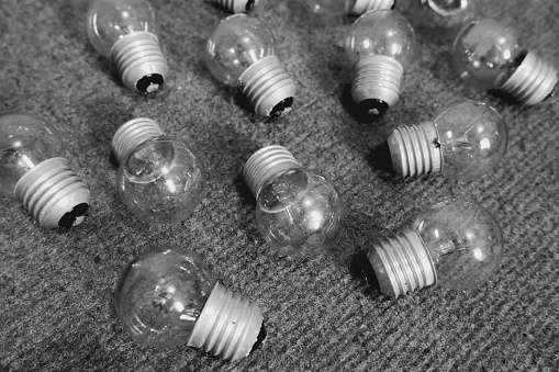 Groups of small light bulbs line the carpeted floor.