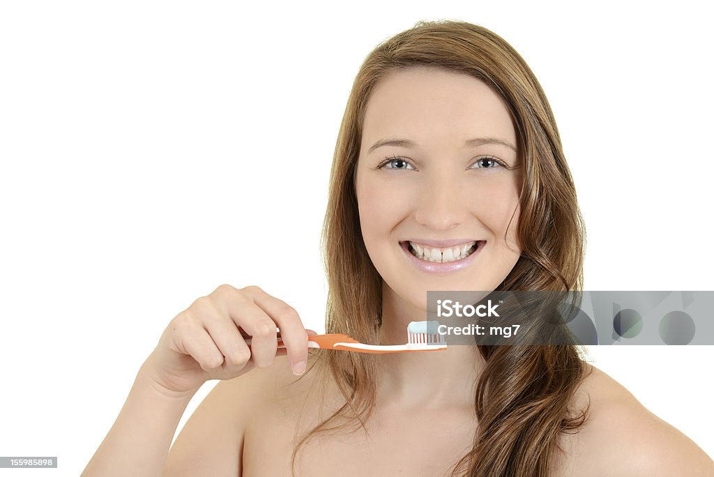 teen girl con cepillo de dientes - Foto de stock de 16-17 años libre de derechos