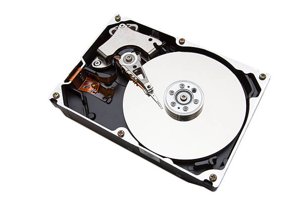Hard Disk Drive An old hard disk drive without top cover, isolated on white background. FL-photography stock pictures, royalty-free photos & images