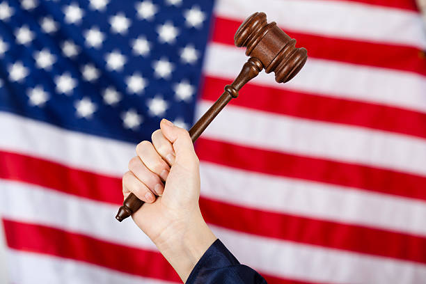 istock Gavel high in the air against US flag 155986580
