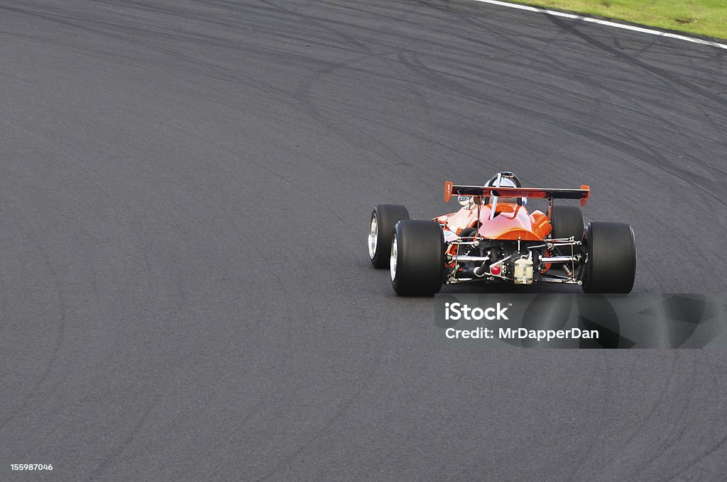 Race Car on a Track a race car taking a corner at Silverstone Silverstone Stock Photo