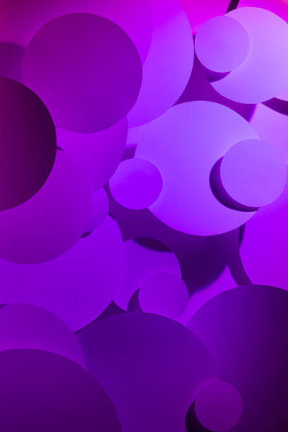 istock Colorful violet pink gradient abstract background of fly paper circles pattern shine in light, top view, backdrop for advertising, design, card, poster, flyer, elegant fashion modern simple style. 1559920293