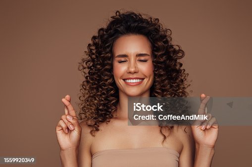 istock Beautiful emotional woman with perfect hairstyle 1559920349
