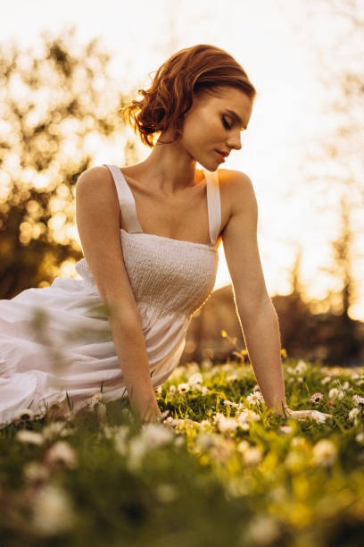 istock Smiling young woman enjoying summer 1559922871