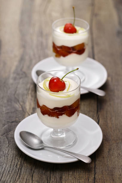 istock Cherry Lemon Syllabub, English Whipped Cream Dessert 1559936553