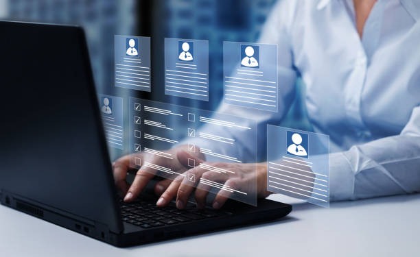 istock Human resources HR and management concept. Employee must complete the online survey form. Marked checklist on a clipboard. 1559948366
