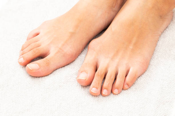 istock A woman's feet on a towel. 1559961713