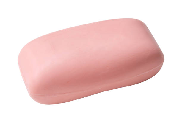 istock Single dry pink soap bar isolated on white background with clipping path. 1559976400