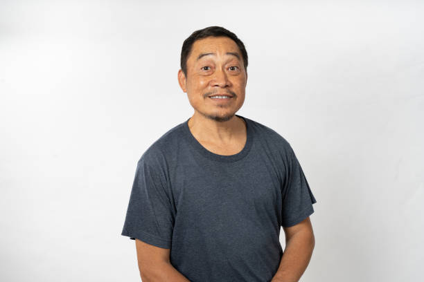 istock Portrait Asian Mature Man Showing Expression and Emotion on Face in studio 1559979155