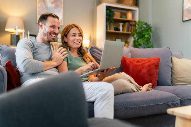 istock Couple bonding and learning together over the laptop. 1559982106