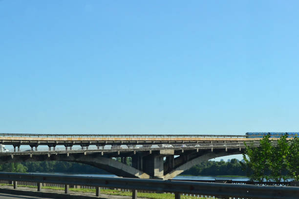 istock blue morning sky and the subway is going over the bridge 1559989465