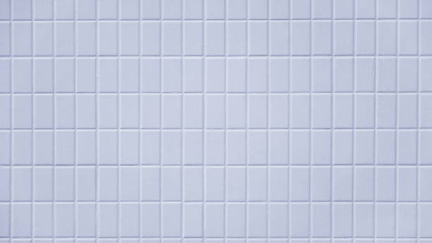 istock White rectangle mosaic tile background, Classic white metro tile, Ceramic tiles wall. 1559991129