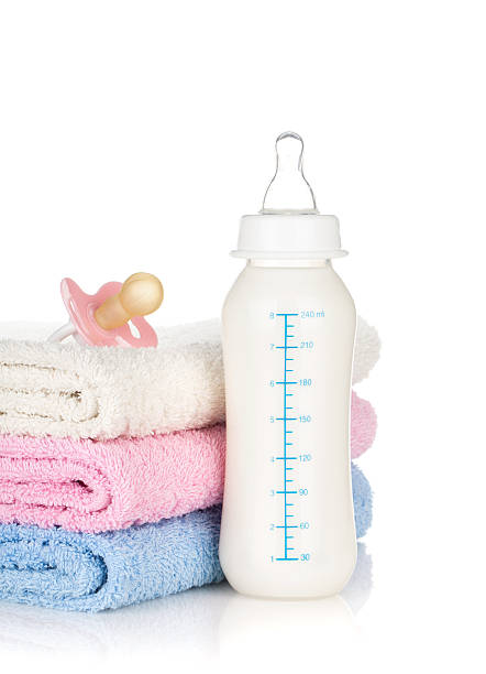 istock Baby bottle, pacifier and towels 156001861