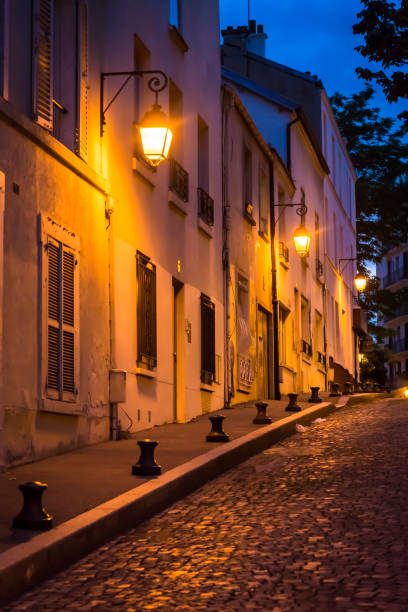 The bell tower of Sacré-Cœur seen from the stairs leading up from rue Lamarck in Montmartre.